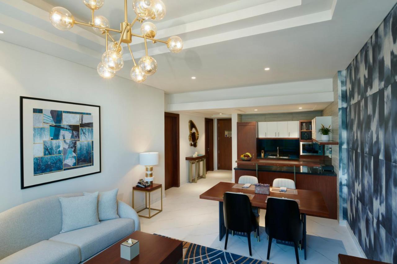 Wyndham Grand Doha West Bay Beach Buitenkant foto A typical apartment interior