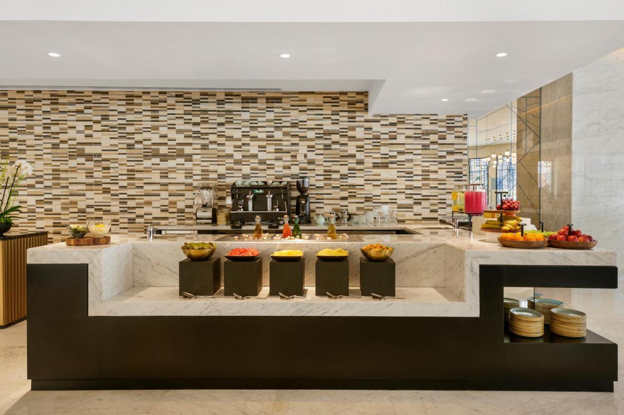 Wyndham Grand Doha West Bay Beach Buitenkant foto The Coffee Shop