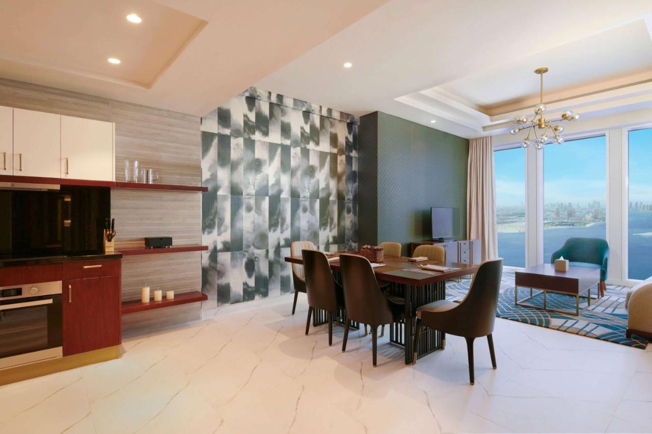 Wyndham Grand Doha West Bay Beach Buitenkant foto A typical apartment interior